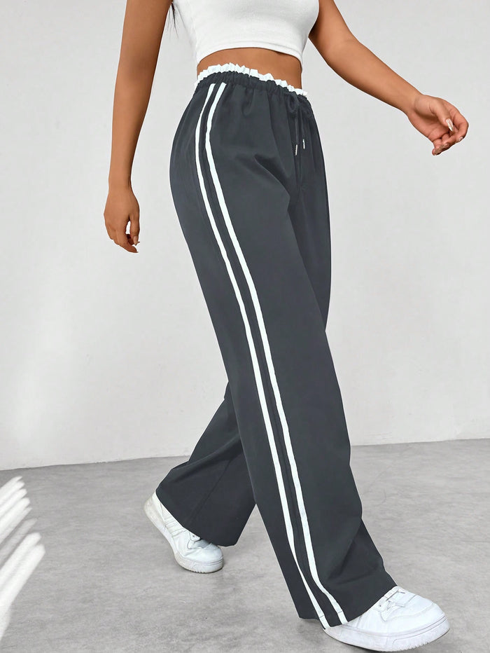 Pantalón deportivo mujer con cintura alta y corte suelto
