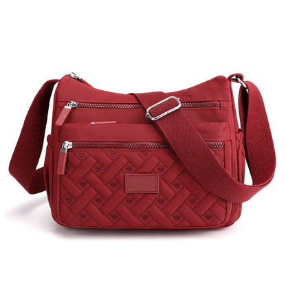 Bolso de hombro Mujer con acabado elegante y diseño clásico