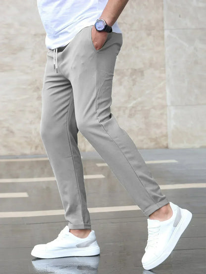 Pantalón deportivo hombre corte ajustado estilo urbano
