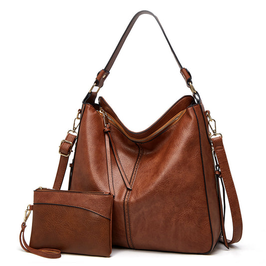 Set bolso bandolera y minibolso muñeca piel sintetica unisex - Mavetta