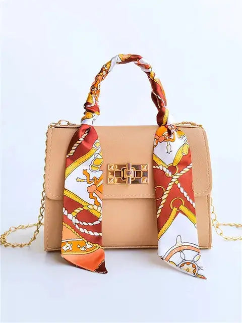 Bolso de mano mujer con cadena y pañuelo decorativo elegante