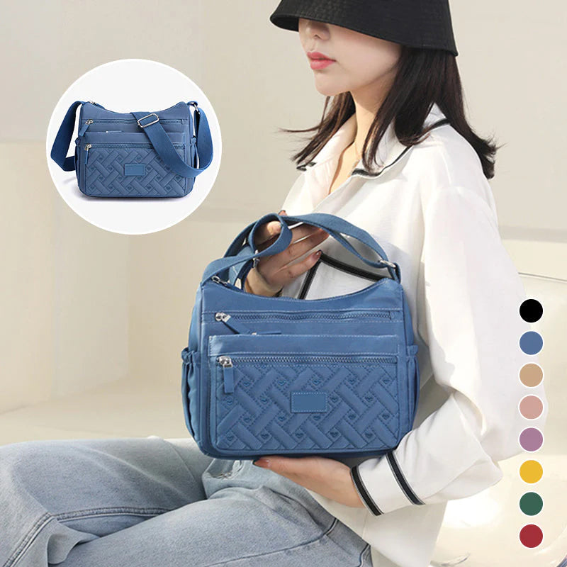 Bolso de hombro Mujer con acabado elegante y diseño clásico