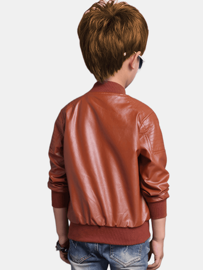 Chaqueta niño con cremallera y cuello alto ajustado