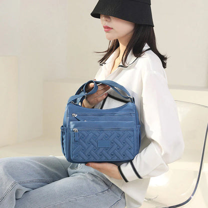 Bolso de hombro Mujer con acabado elegante y diseño clásico
