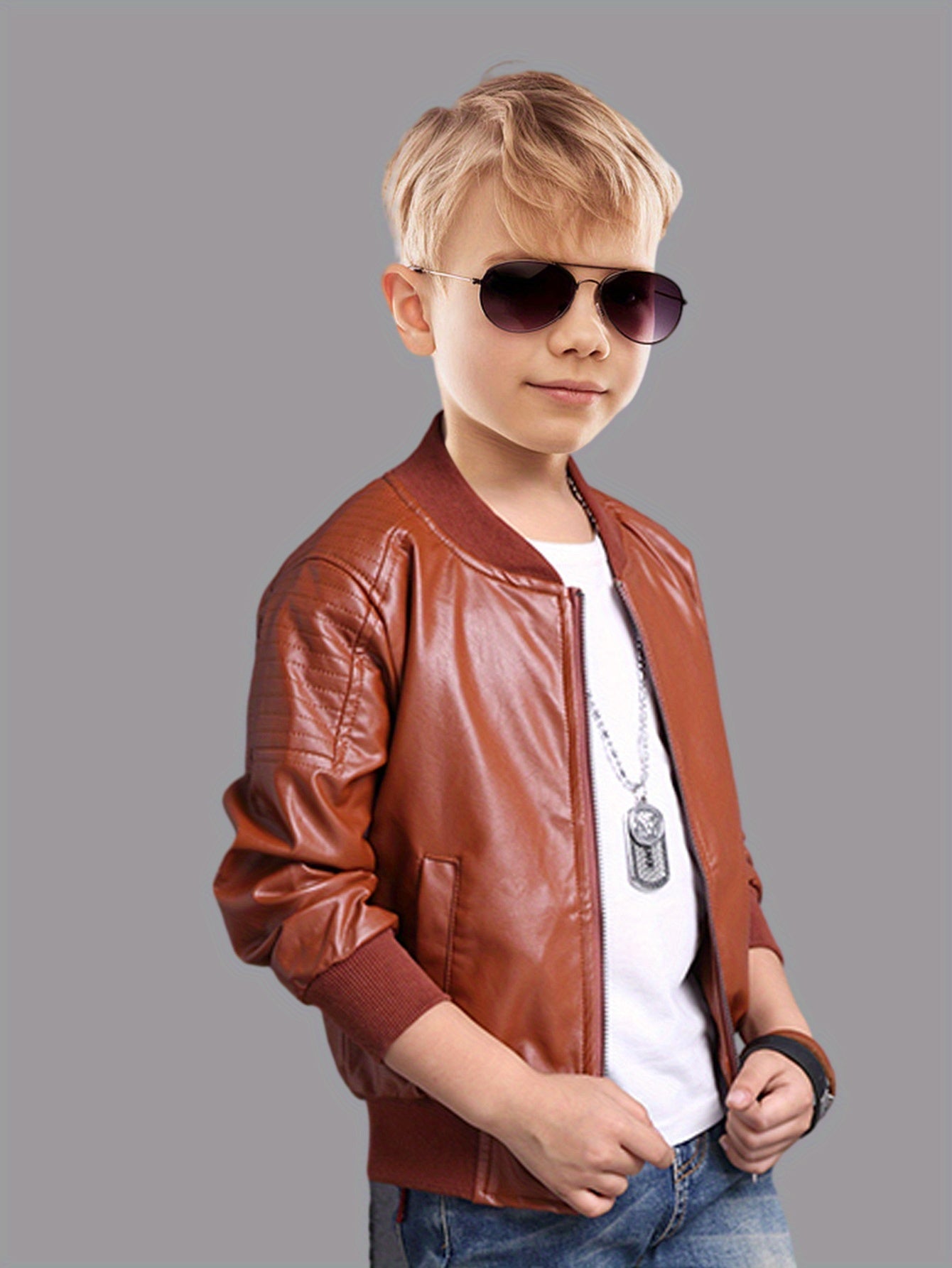 Chaqueta niño con cremallera y cuello alto ajustado