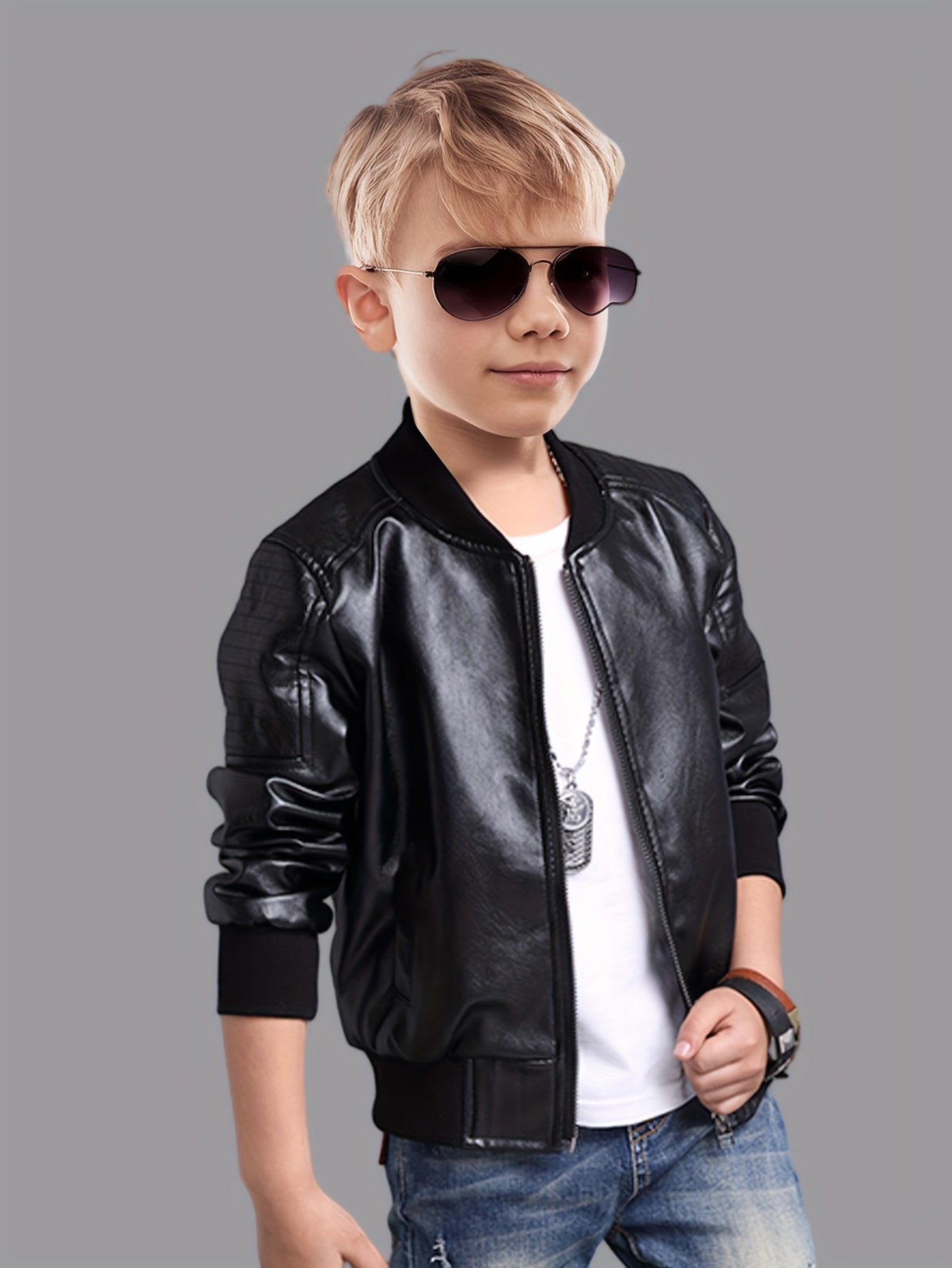 Chaqueta niño con cremallera y cuello alto ajustado