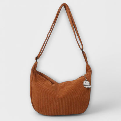 Bolso de hombro mujer con forma elegante acabado pulido