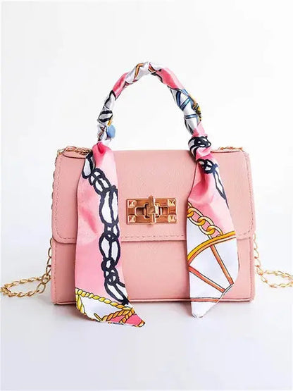 Bolso de mano mujer con cadena y pañuelo decorativo elegante