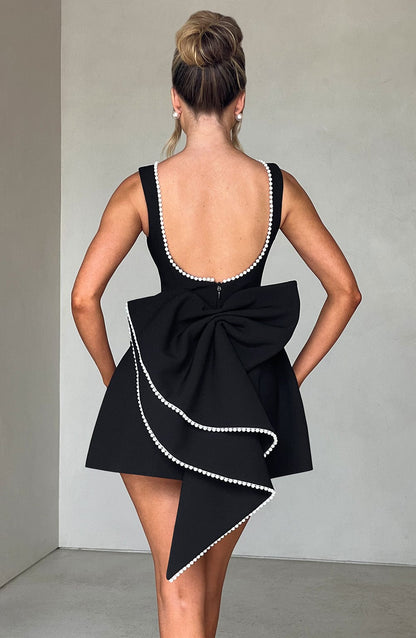 Vestido mini mujer sin mangas perlas corte en A