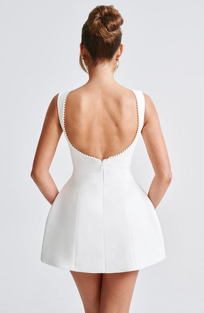 Vestido mini mujer sin mangas perlas corte en A
