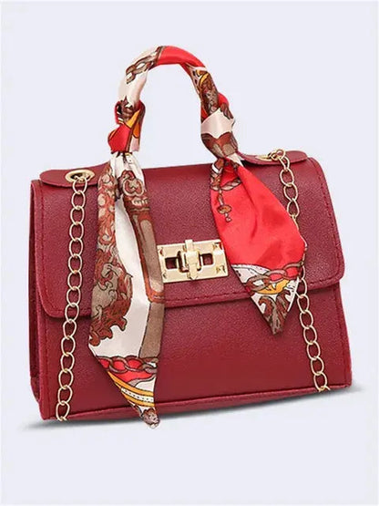 Bolso de mano mujer con cadena y pañuelo decorativo elegante