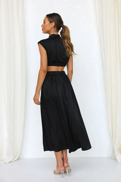 Vestido midi mujer con corte cut out sin mangas cuello alto