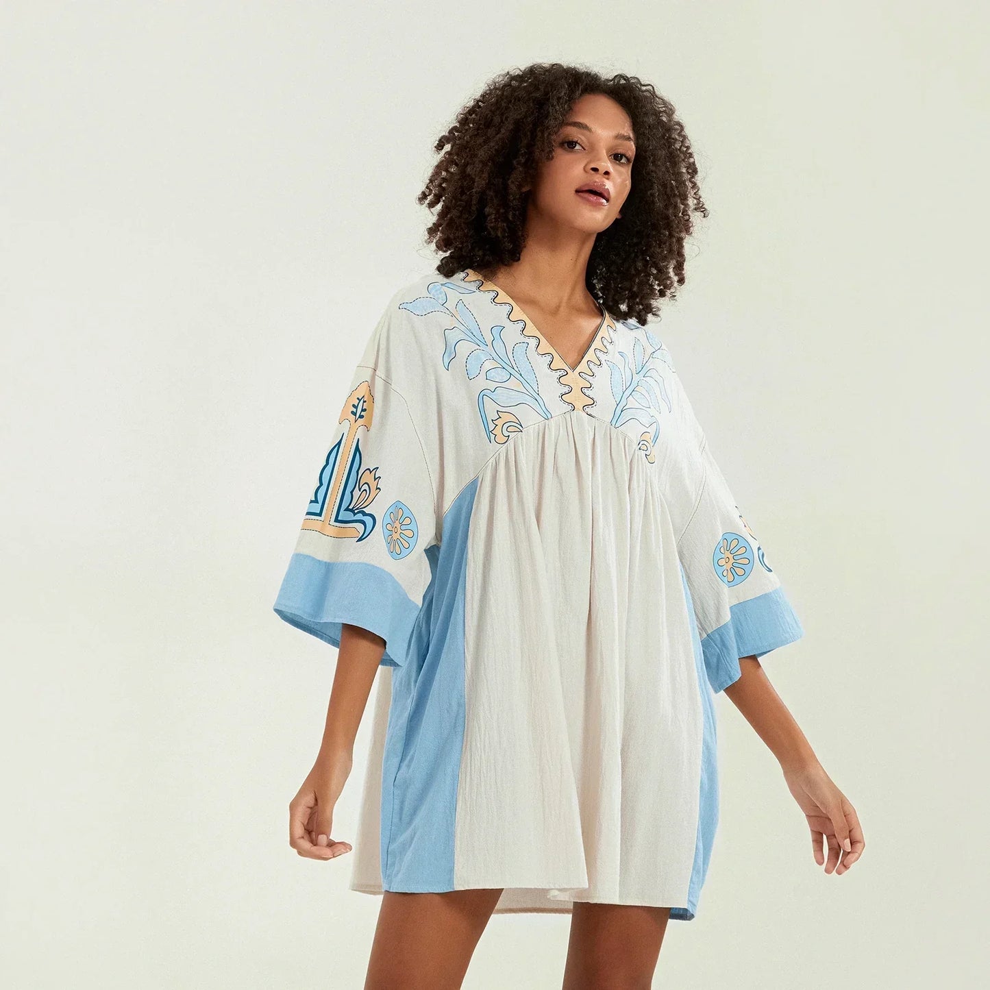 Vestido túnica mujer con bordados escote en V