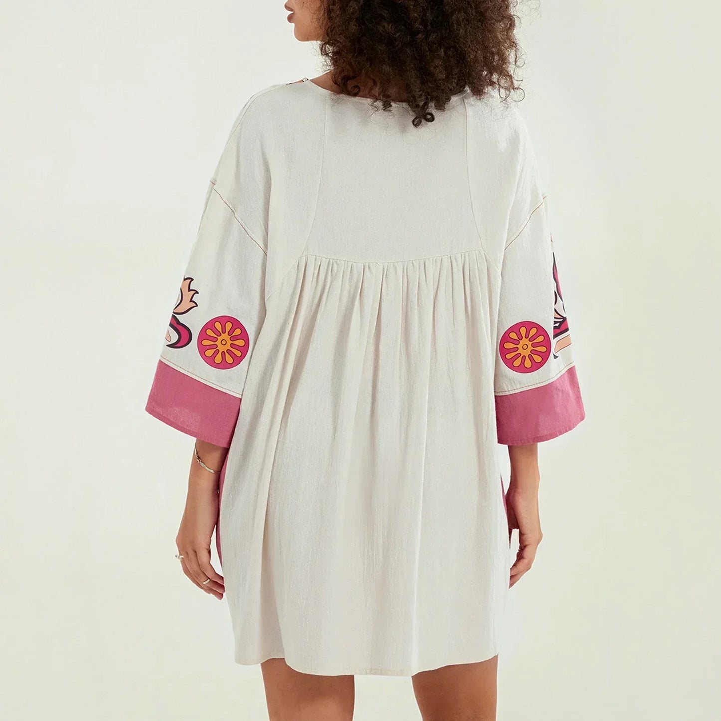 Vestido túnica mujer con bordados escote en V