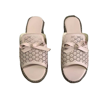 Zapatillas abiertas mujer con perforaciones y lazo