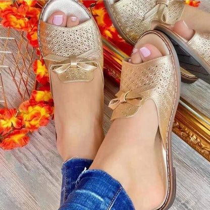 Zapatillas abiertas mujer con perforaciones y lazo