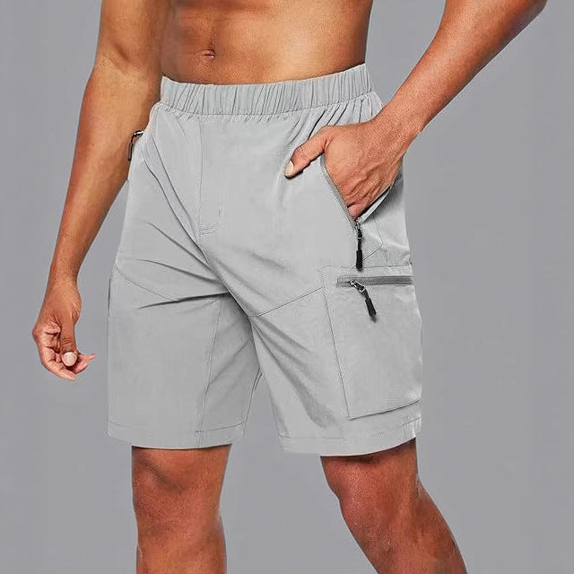 Short deportivo hombre con bolsillos cremallera ajustado