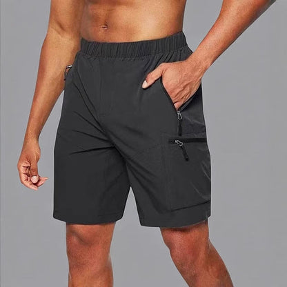 Short deportivo hombre con bolsillos cremallera ajustado