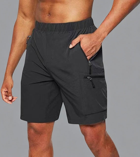 Short deportivo hombre con bolsillos cremallera ajustado