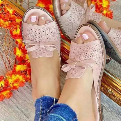 Zapatillas abiertas mujer con perforaciones y lazo