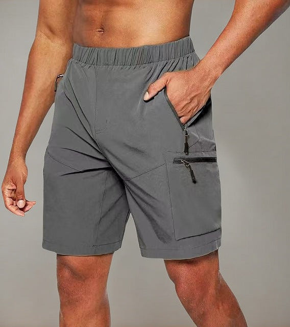 Short deportivo hombre con bolsillos cremallera ajustado