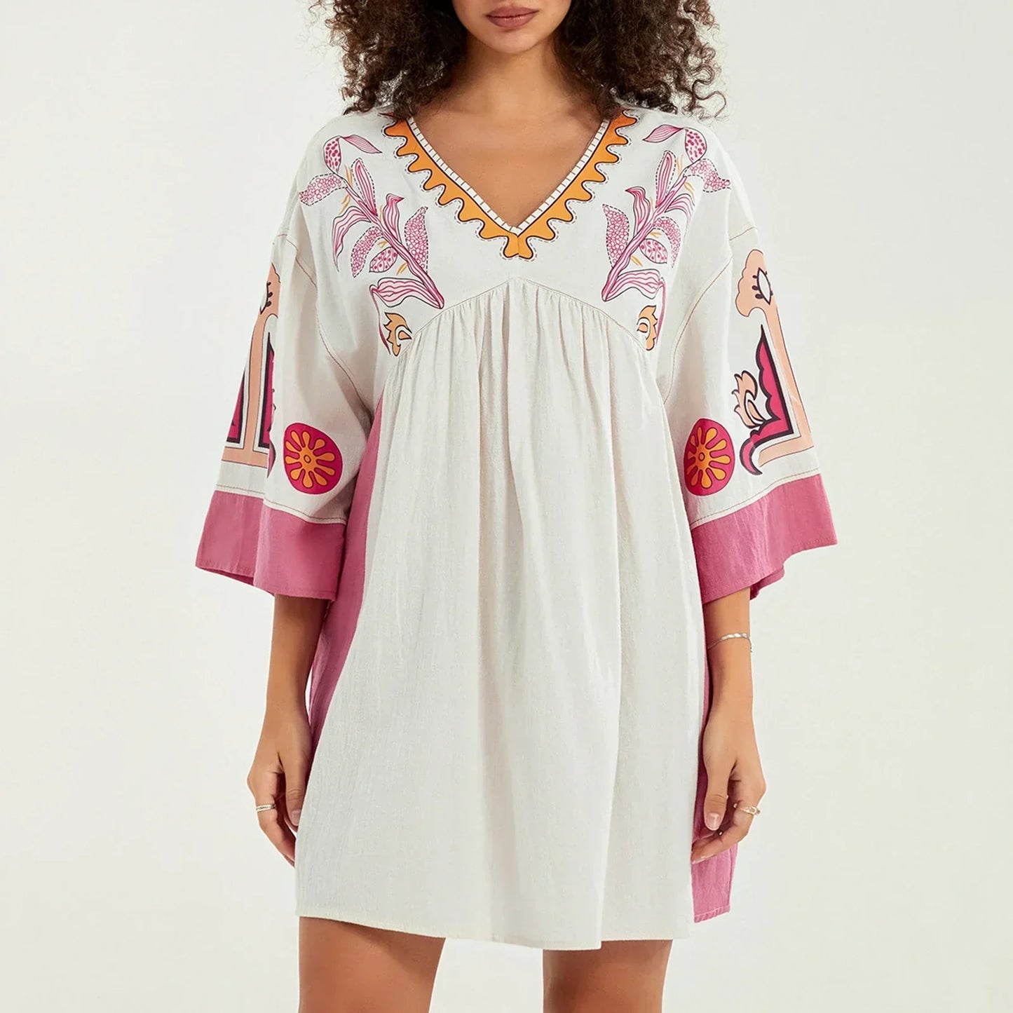 Vestido túnica mujer con bordados escote en V