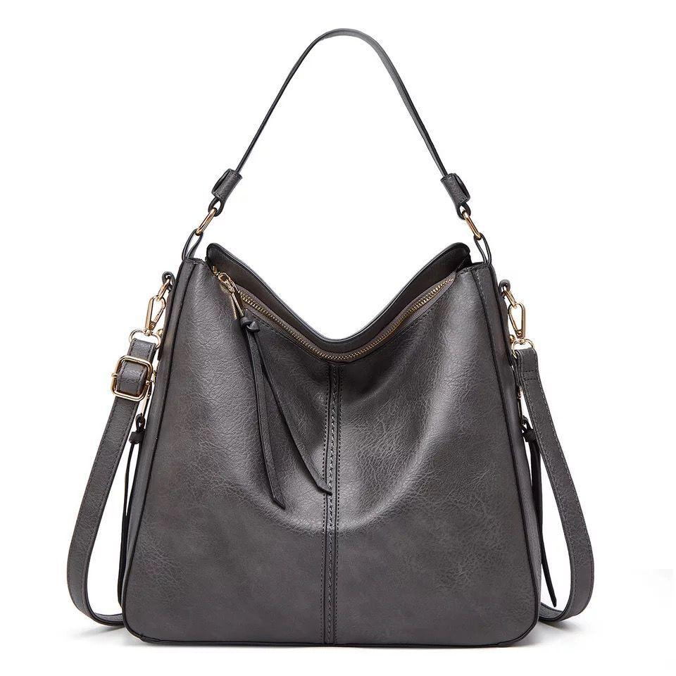 Set bolso bandolera y minibolso muñeca piel sintetica unisex