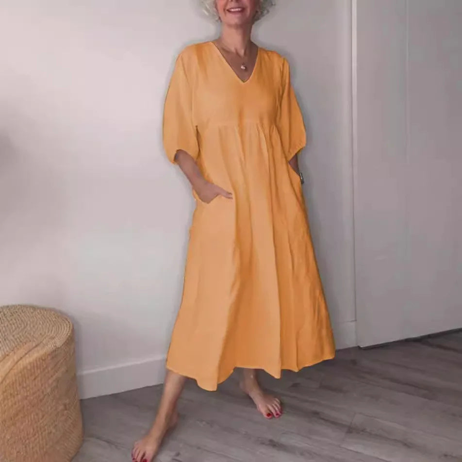 Vestido midi mujer con escote en V bolsillos y corte fluido - Mavetta