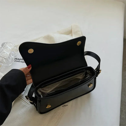 Bolso mujer de piel elegante y versátil con asa corta