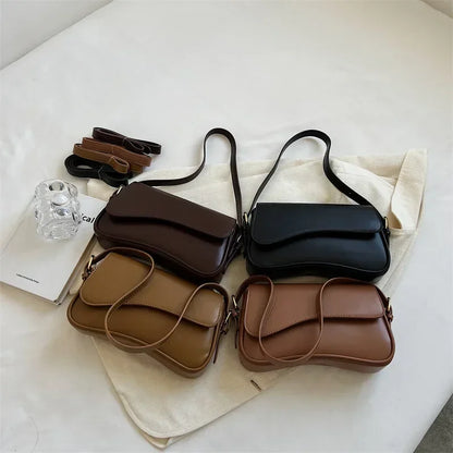 Bolso mujer de piel elegante y versátil con asa corta