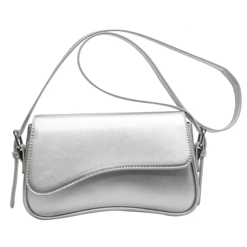 Bolso mujer de piel elegante y versátil con asa corta