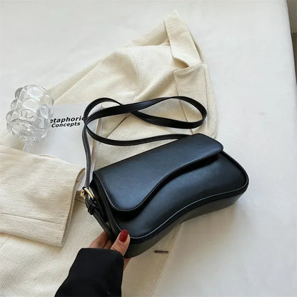 Bolso mujer de piel elegante y versátil con asa corta
