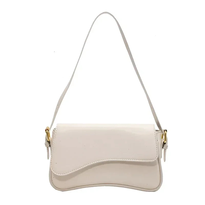 Bolso mujer de piel elegante y versátil con asa corta