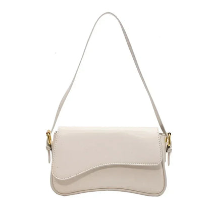 Bolso mujer de piel elegante y versátil con asa corta