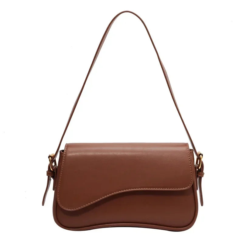 Bolso mujer de piel elegante y versátil con asa corta