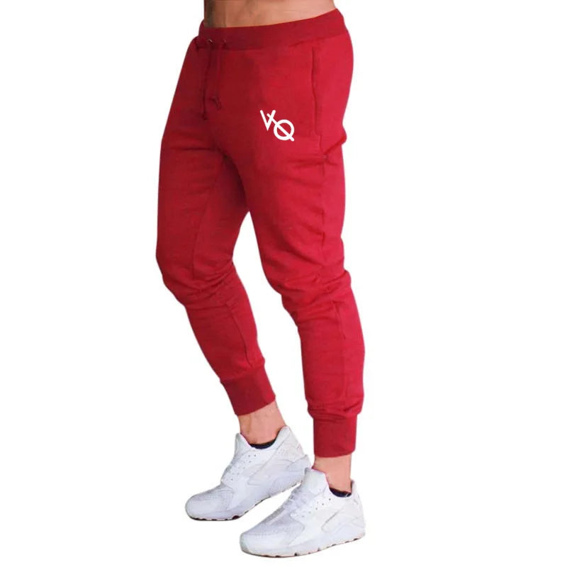 Pantalón deportivo hombre slim fit con puños en tobillos