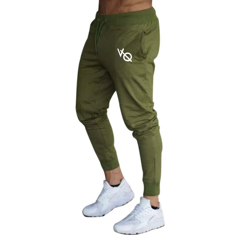 Pantalón deportivo hombre slim fit con puños en tobillos