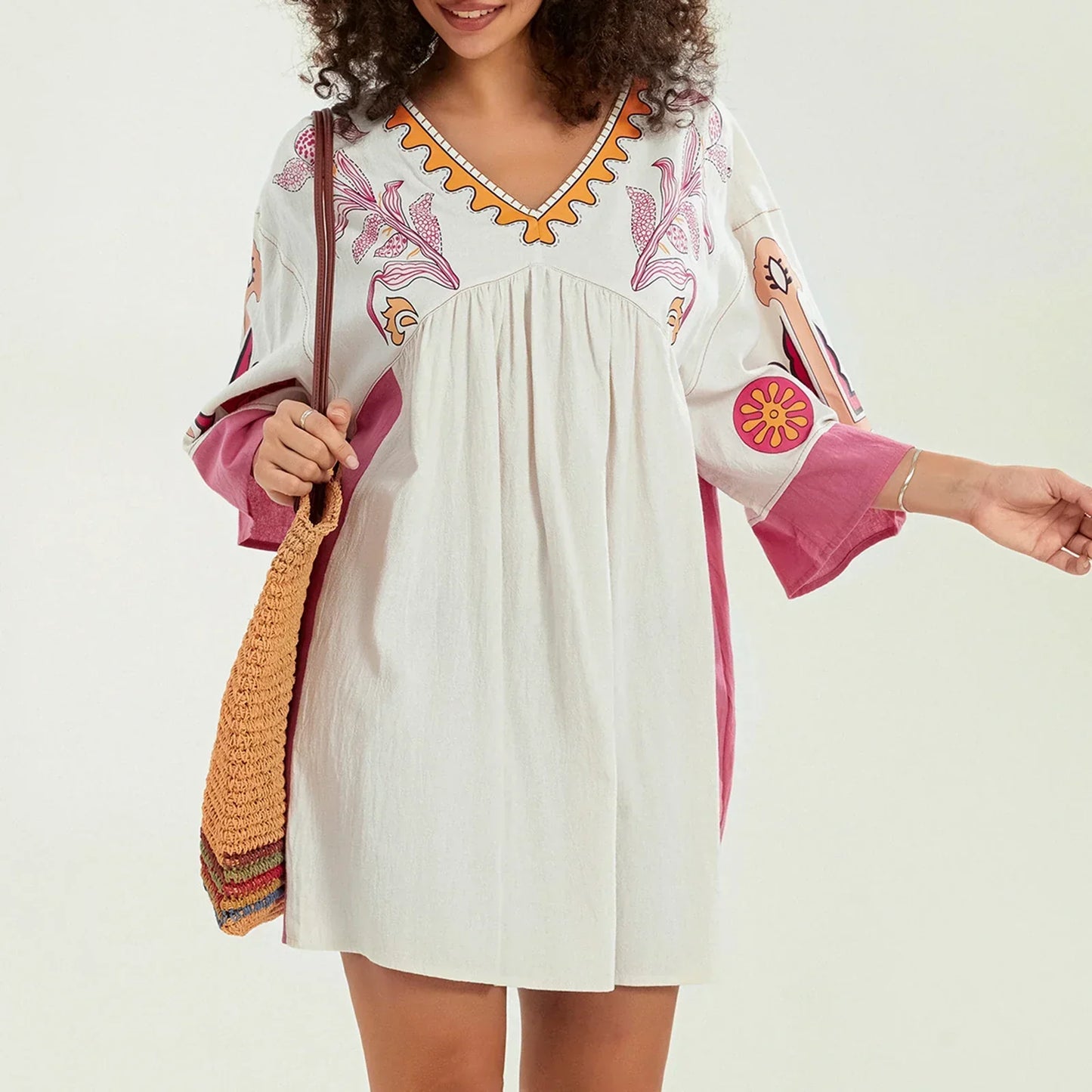 Vestido túnica mujer con bordados escote en V
