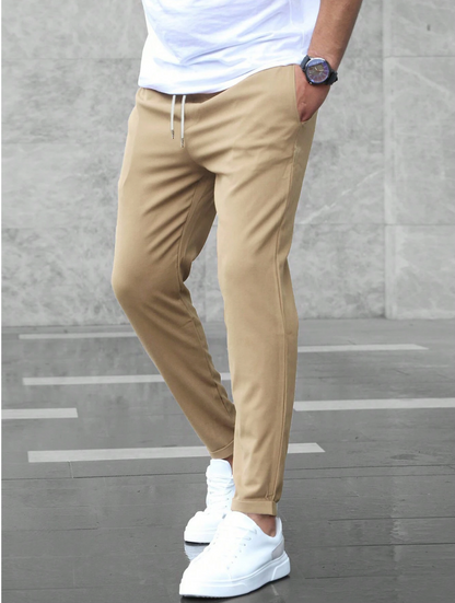 Pantalón deportivo hombre corte ajustado estilo urbano