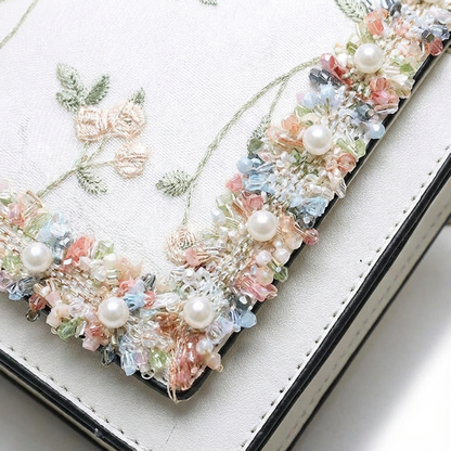 Bolso de mano mujer con asa superior decorativa elegante