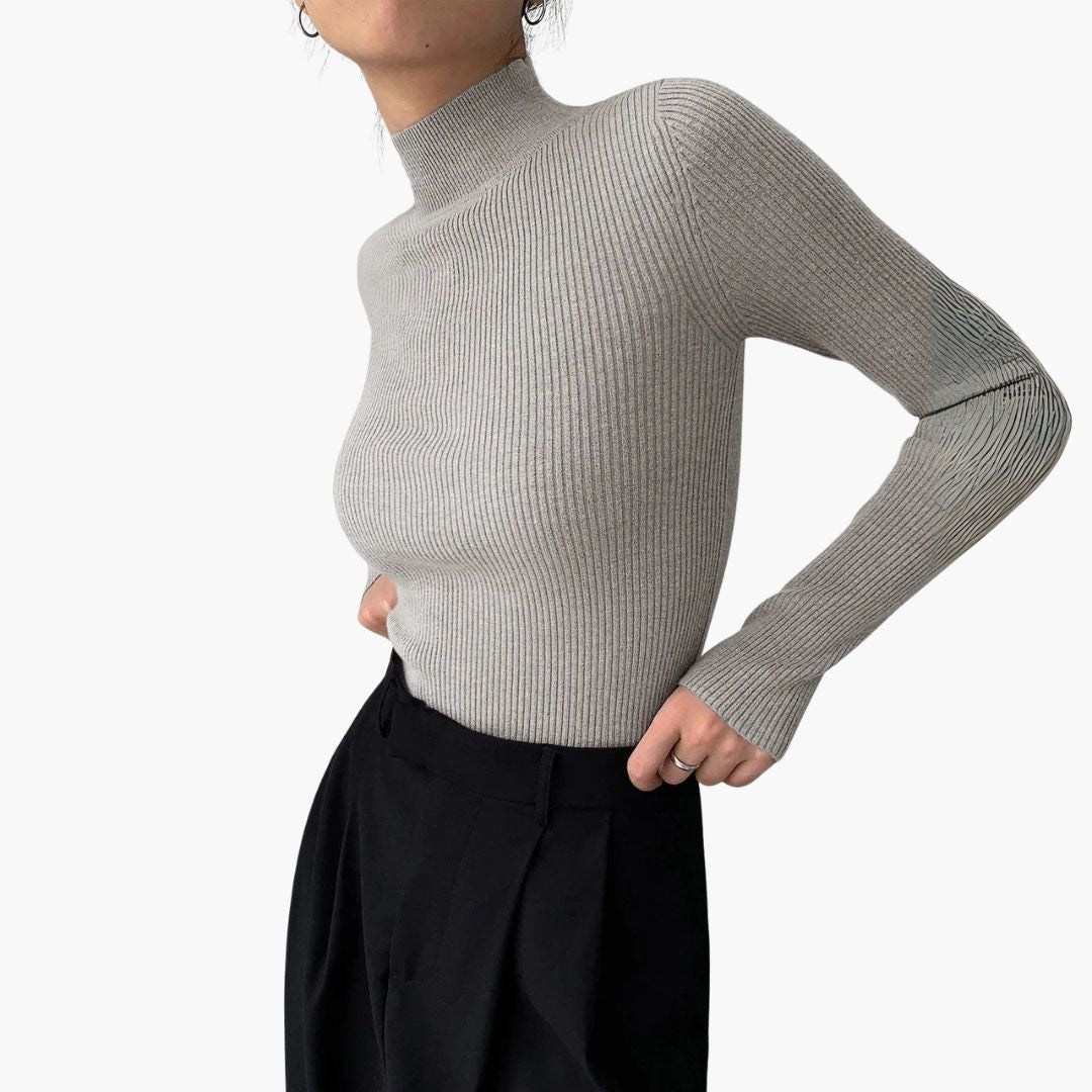 Jersey mujer de punto cuello alto falso corte entallado