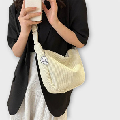 Bolso de hombro mujer con forma elegante acabado pulido