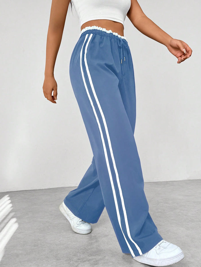 Pantalón deportivo mujer con cintura alta y corte suelto