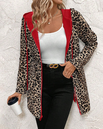 Abrigo reversible mujer con capucha y estampado animal