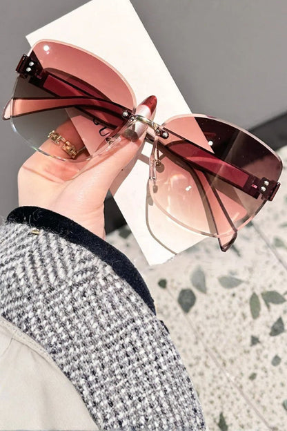 Gafas de sol mujer sin montura estilo gato lente degradada