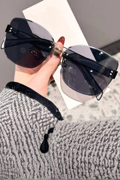 Gafas de sol mujer sin montura estilo gato lente degradada