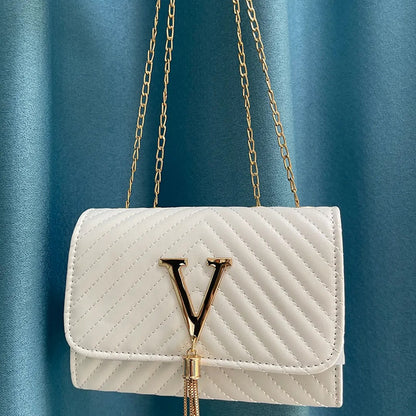 Bolso de mano Mujer con borla decorativa y diseño moderno