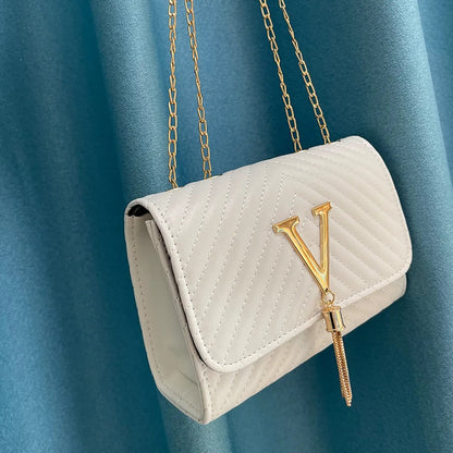 Bolso de mano Mujer con borla decorativa y diseño moderno