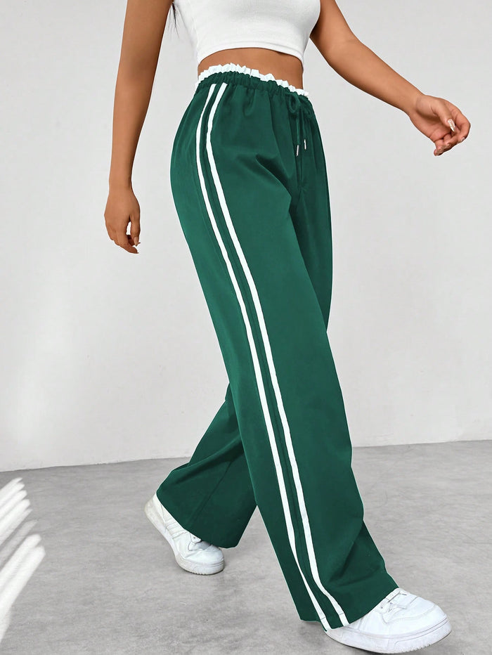 Pantalón deportivo mujer con cintura alta y corte suelto