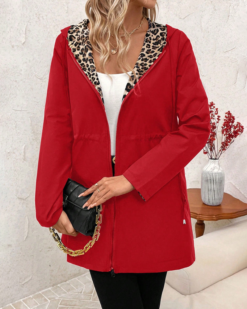 Abrigo reversible mujer con capucha y estampado animal